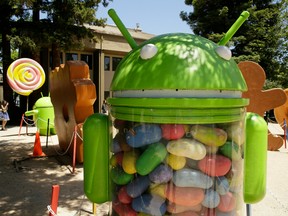 Android lawn statues are seen at Google's headquarters in Mountain View, Calif.