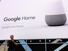 Google Vice President of Product Management Mario Queiroz shows the Google Home during Google I/O 2016.
