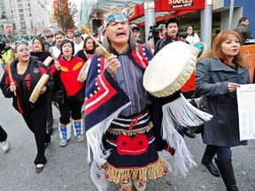 Members from a coalition of First Nations groups protest Enbridge's proposed  Northern Gateway pipeline in April 2012.