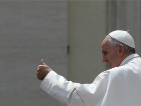 Pope Francis leaves after his weekly general audience in St. Peter's Square at the Vatican