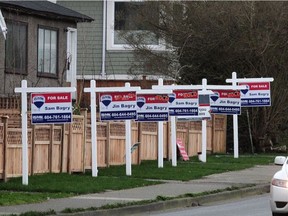 For Sale signs on Grandview Highway in Vancouver.