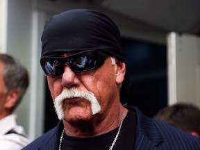 Hulk Hogan, whose given name is Terry Bollea walks out of the courthouse on March 18, 2016, in St. Petersburg, Fla. Bollea was awarded $115 million in damages in his lawsuit against the gossip website Gawker.