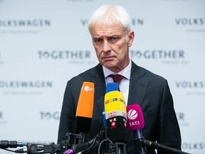 Matthias Mueller, chief executive officer of Volkswagen AG, speaks to television crews after making a new strategy announcement at the automaker's headquarters in Wolfsburg, Germany, on Thursday, June 16, 2016. Mueller mapped out a sweeping strategy overhaul focused on electric cars, automated driving and services such as ride-hailing in an effort to emerge from the diesel-cheating scandal.