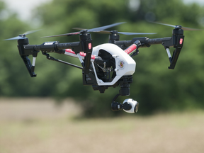 A DJI Inspire drone flies at a testing site