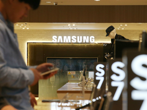 Samsung logos are displayed at the company's flagship store in Seoul.