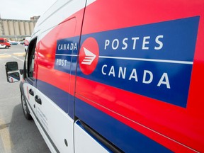 A Canada Post truck is parked at a sorting centre in Montreal