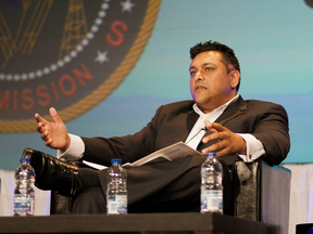 Raj Shoan of the Canadian Radio-Television and Telecommunications Commission (CRTC), speaks during a panel discussion at the Canadian Telecom Summit in Toronto