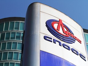 CNOOC warned today it will lose $1.2 billion in the first half as it writes down its Canadian assets, an oilsands site that has been beset by accidents, explosions and pipeline spills.