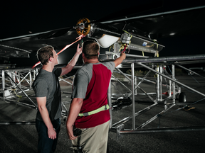 Aquila in position prior to takeoff. (From left: Kathryn Cook, technical program manager for Aquila; Yael Maguire, head of Connectivity Lab; Mark Zuckerberg, Facebook founder and CEO; Jay Parikh, global head of engineering and infrastructure)