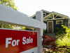 A sold sign is pictured outside a home in Vancouver, B.C.