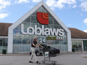 Loblaw Companies Ltd eked out more revenue from its diverse retail, financial services and real estate businesses in the second quarter, but higher interest expenses and financing charges bit into profit.