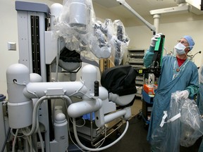 Within five years, one in three U.S. surgeries - more than double current levels - is expected to be performed with robotic systems, with surgeons sitting at computer consoles guiding mechanical arms.