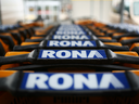 Rona Inc. signage is displayed on shopping carts at the company's store in Toronto