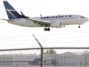 WestJet Airlines Ltd reported a 40.5 per cent fall in quarterly profit as higher costs squeezed margins.