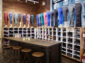 Lululemon revamped its store wall of yoga pants with new fabrics and organized them by how they feel — relaxed, naked, hugged, held-in and tight.
