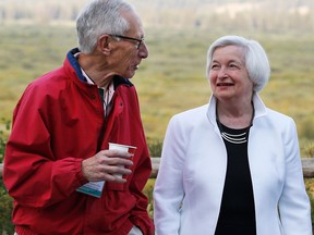 Federal Reserve Chair Janet Yellen, right, talks with Stanley Fischer, vice chairman of the Board of Governors of the Federal Reserve System.
