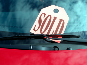 A sold sign on a vehicle at a dealership in Ottawa, Ont.