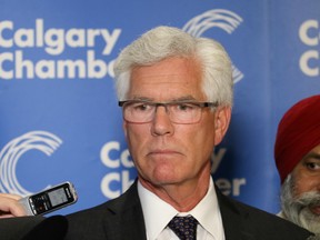 Jim Carr, Canada's Minister of Natural Resources, answers media questions after taking part in discussions with energy industry experts