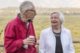 Stanley Fischer, vice chairman of the U.S. Federal Reserve, left, and Janet Yellen, chair of the U.S. Federal Reserve, right, speak outside of the Jackson Lake Lodge during the Jackson Hole economic symposium.