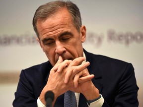 Bank of England Governor Mark Carney cut its key rate to 0.25 per cent Thursday.