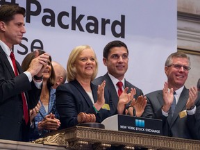 Meg Whitman, president and chief executive officer of Hewlett Packard, rings the opening bell of the New York Stock Exchange. She is a fan of photo collages, and a typical post will feature images of her at a company event.