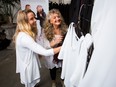 Jan Stimpson, right, and her daughter Abbey Stimpson at their clothing company Sympli Designs in Burnaby, B.C.