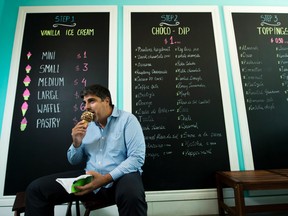 Sam Arif, co owner of La Diperie ice cream store poses for a photograph in Toronto