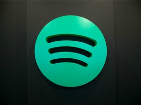 A Spotify Ltd. logo sits on display inside the music streaming company's offices in Berlin, Germany