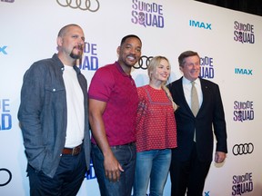 (Left to Right) Director David Ayer and actors Will Smith and Margot Robbie pose for a photo with Toronto Mayor John Tory to promote their new film "Suicide Squad"  in Toronto during a red carpet event.