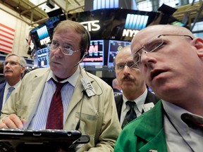 North American markets are drooping today as investors play a waiting game with the Fed and lower metal and oil prices weighed on resource stocks.