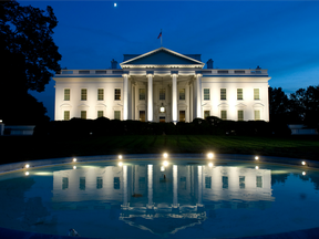 The White House at dusk as illuminated by lights from the North Lawn in Washington.