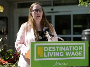 Alberta Labour Minister Christina Gray says cabinet has passed the required regulation to not only raise the rate to $12.20 an hour this October, but also to boost it again in October 2017 and once more in October 2018.