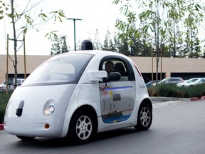 A self-driving car traversing a parking lot at Google's headquarters in Mountain View, California.