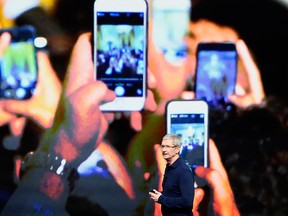 Tim Cook, chief executive of Apple Inc., unveils the iPhone 7.