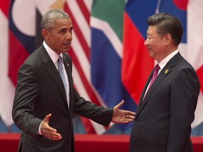United States President Barack Obama is greeted by Chinese President Xi Jinping during the official welcome to the G20 Leaders Summit in Hangzhou on Sunday.