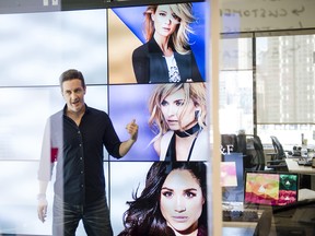 David Dougherty, co-founder, president, chief innovation officer, poses for a portrait while discussing a new smart mirror his company has created to help retailers.