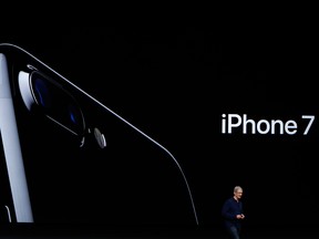 Apple CEO Tim Cook introduces the new iPhone 7 during an event inside Bill Graham Civic Auditorium in San Francisco, California on September 07, 2016.