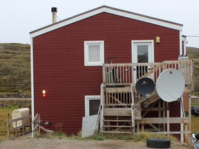 It's common for houses to have multiple satellites, as seen on this home in Iqaluit, Nunavut.
