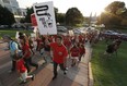 A line of protesters against the construction of the Dakota Access oil pipeline on the Standing Rock Reservation in North Dakota head to a unity rally on the west steps of the State Capitol late Thursday, Sept. 8, 2016, in Denver. Several hundred marchers walked from the four directions to the Capitol to take part in the rally against the oil pipeline. (AP Photo/David Zalubowski)