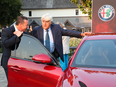 Alfa Romeo CEO Reid Bigland and Jay Leno check out the 2017 Alfa Romeo Giulia at Folktale Winery in Carmel, Calif. Bigland was rewarded with leadership of the Alfa Maserati unit after making Fiat Chrysler a top seller in Canada and the U.S.