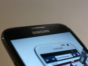 Samsung Electronics Co.'s Galaxy Note 2 smartphone is displayed at a launch event in Seoul, South Korea