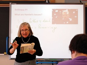 High schools have incorporated new technologies more rapidly than universities. Here a teacher uses a SMART Board, to teach Grade 12 students William Shakespeare's play Hamlet at Valley Heights Secondary School in Langton, Ont.