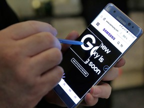 Aviation safety officials took the extraordinary step of warning airline passengers not to turn on or charge a new model Samsung smartphone during flights following numerous reports of the devices catching fire. It is extremely unusual for the FAA to warn passengers about a specific product.