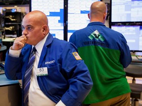 U.S. stock futures are treading water and Canadian stocks look headed for a lower open as investors remained cautious after a broad selloff a day yesterday.