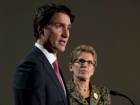 Liberal leader Justin Trudeau and Ontario Premier Kathleen Wynne take part in a joint news conference in Ottawa
