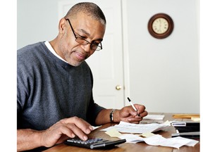 Local Input~ Mature man doing finances in home office. Credit: Getty Images.