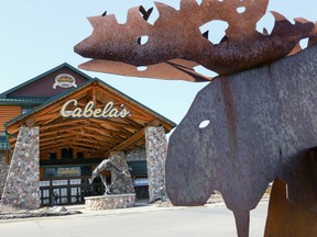 Statues of wildlife adorn the entrance to a Cabela's store