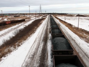 Railway cars stretch down a track into Sept-Îles where the iron ore arrives from just over 300 km away in Labrador City.