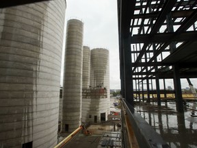 Silos are seen next to a new flour mill under construction at the Parrish and Heimbecker terminal at the Port of Hamilton in Hamilton, Ontario.