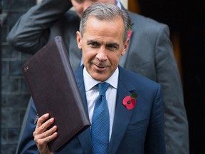 Bank of England Governor Mark Carney said on Monday he has decided to stay in charge of the central bank for an extra year until 2019.